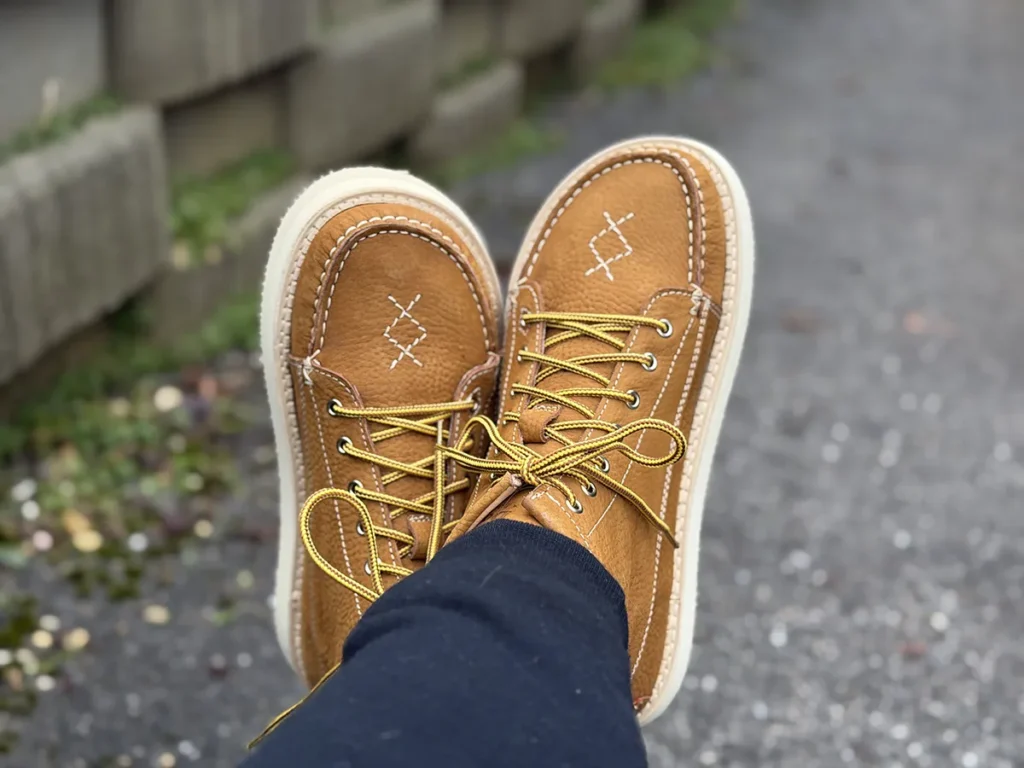 Foot-shaped shoes with roomy toe box, worn outside