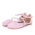 Light pink ballet flats with crisscross straps over the foot