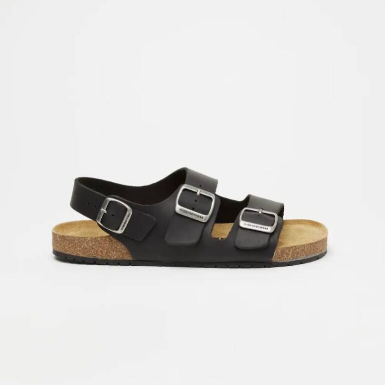 Black barefoot slide sandals with two buckle straps, product photo